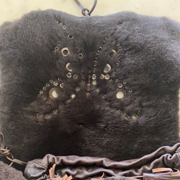 Vintage gently used brown suede Dolce and Gabbana Butterfly Messenger Bag. - Picture 7 of 13